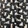 Katoenen stof - Kattenpootjes en garen op zwart